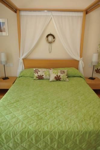 Отель Natura Beach Hotel & Villas