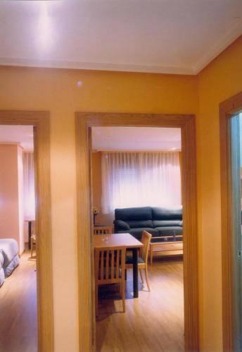 Апартаменты Apartamentos Turisticos Puerta de León