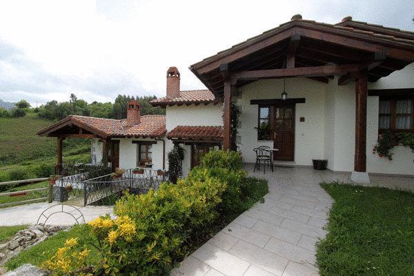 Апартаменты Apartamentos Rurales La Güertona