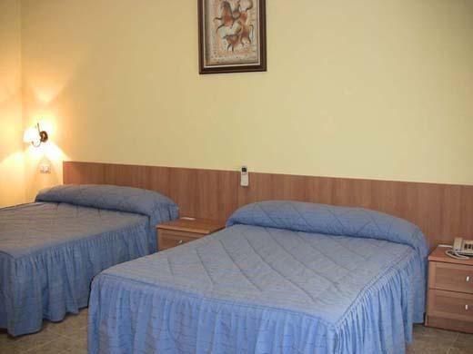 Отель Hotel Los Hermanos