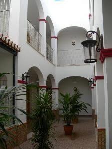 Отель Hotel Plaza Escribano