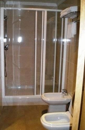 Апартаменты Apartamentos Turísticos Plaza del Olvido