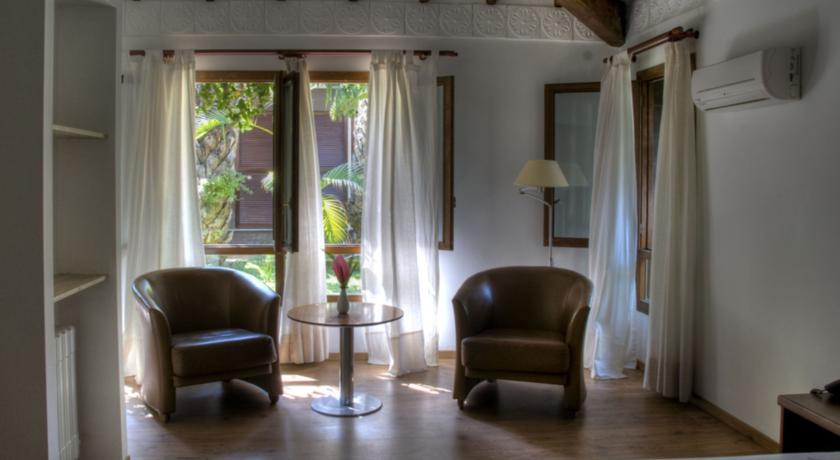 Отель Hotel Huerto del Cura