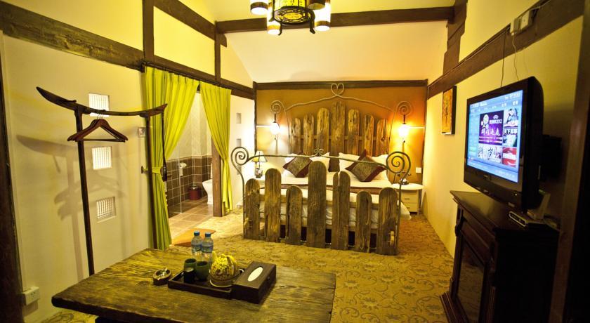 Отель Lijiang Yunjin Yaju Courtyard Hotel