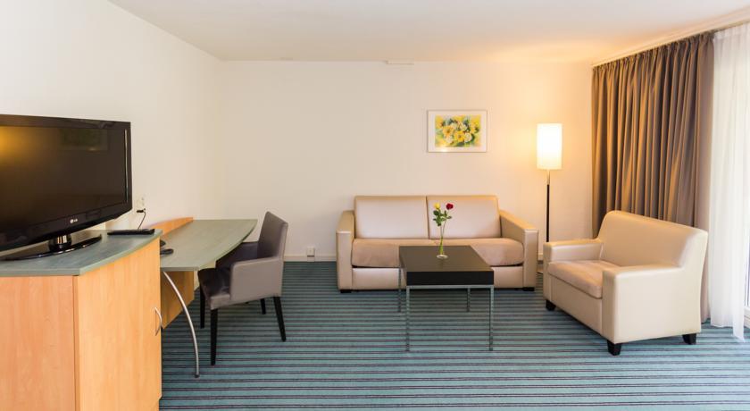 Отель Apart Hotel operated by Hilton