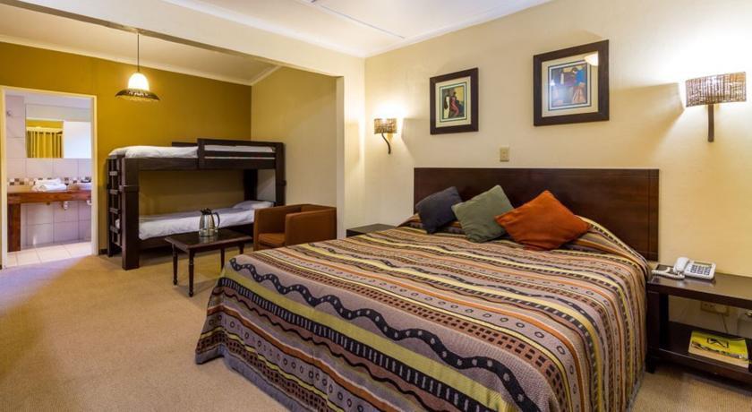 Отель Hotel Numbi & Garden Suites
