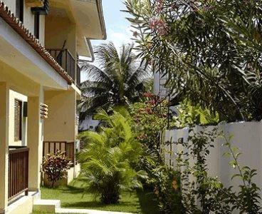 Апартаменты Condomínio Oasis das Flores