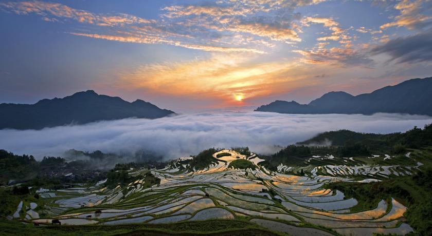 Отель Huaqiao New Century Grand Hotel Lishui