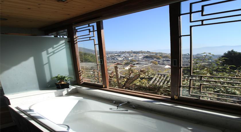 Отель Lijiang Lize Graceland Merry Inn
