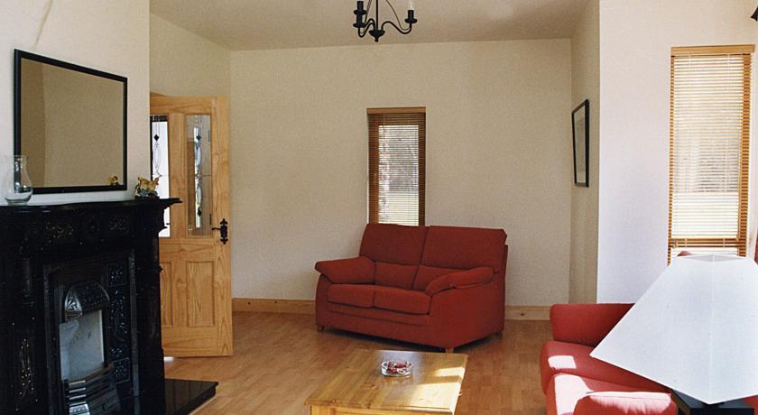 Отель Caragh Glen Holiday Homes