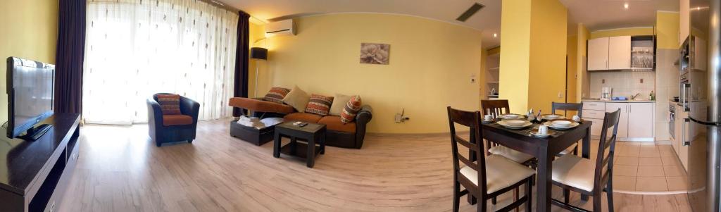 Апартаменты Coralia Serviced Apartments