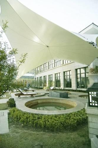 Отель New Century Grand Hotel Kaifeng