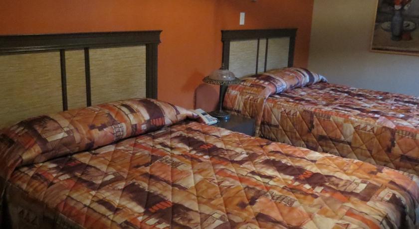 Отель Motel au Soleil Couchant