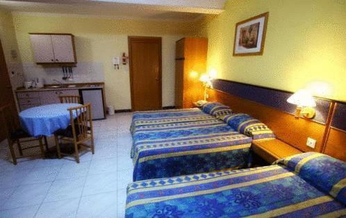 Апартаменты 115 The Strand Apart hotel