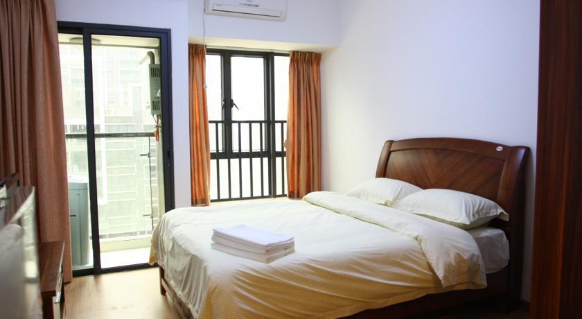 Апартаменты Foshan Jiuding International Apartment