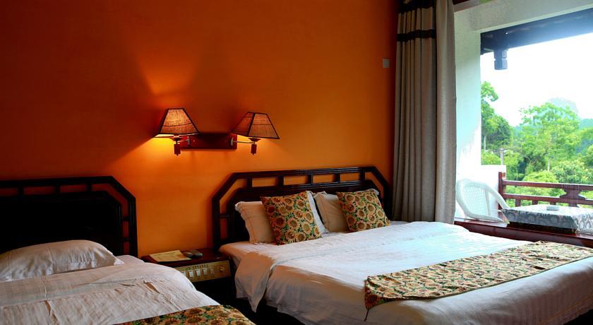 Отель Snow Lion Riverside Resort