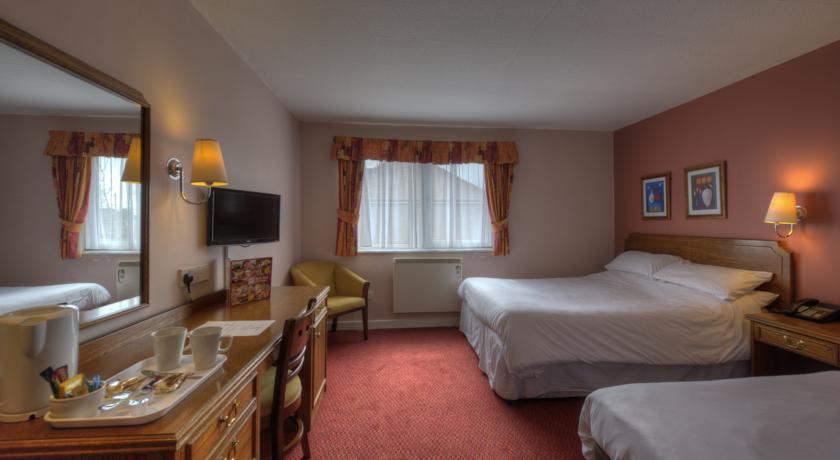Отель Longshoot Inn by Good Night Inns