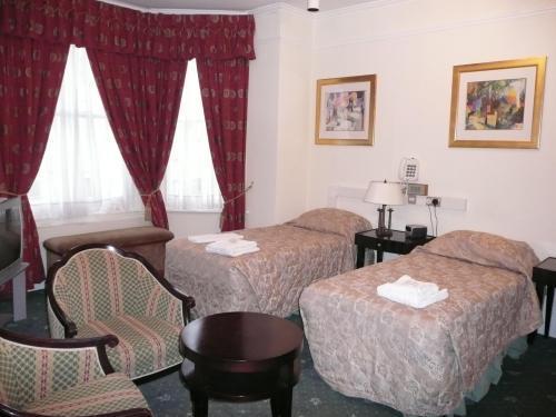 Отель The Palm Court Hotel