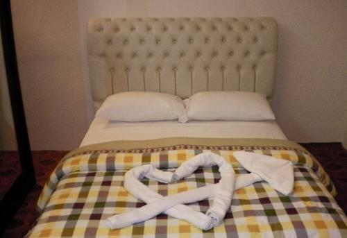 Excelencia Hotel Suites