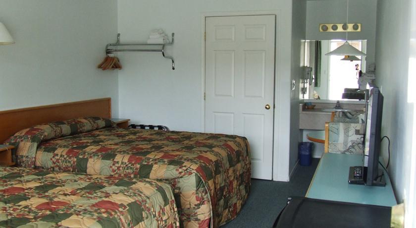 Отель Ponderosa Motor Inn