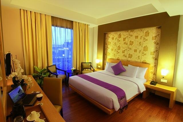 Отель The Axana Hotel - Padang