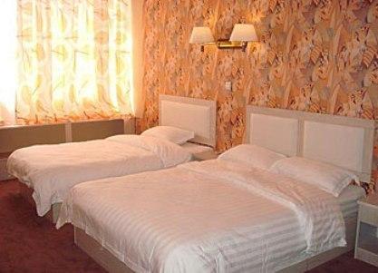 Отель Qinglong Business Hotel - Qingdao