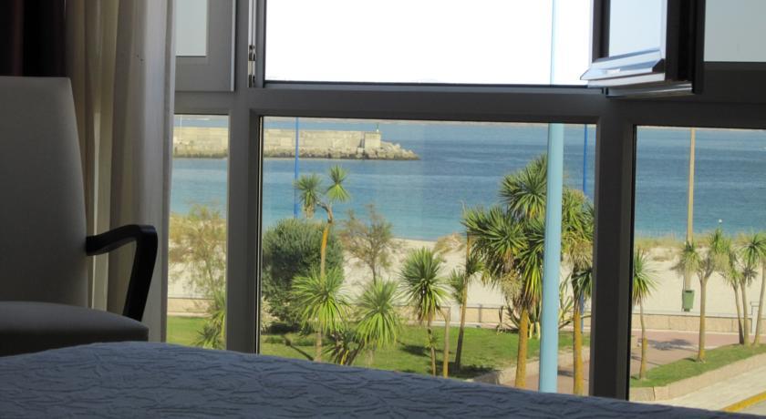 Отель Hotel Playa De Laxe