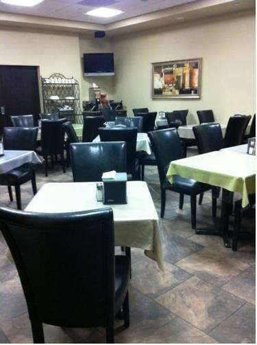 Отель Simmons Suites