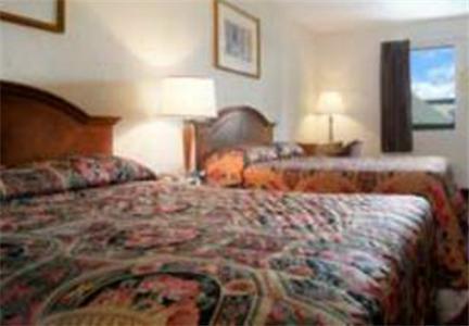 Отель Guest Inn at Six Flags Austell