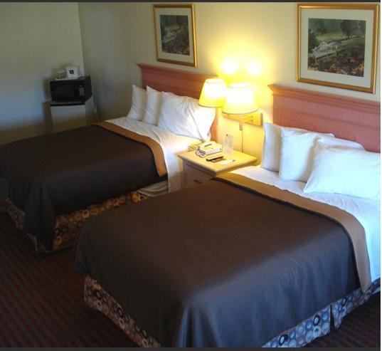 Отель All Seasons Inn & Suites