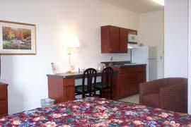 Отель Sandalwood Studios & Suites