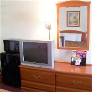 Отель Travelers Inn and Suites