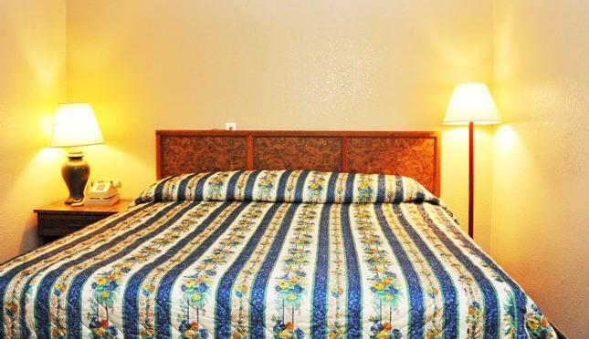Отель Travelers Inn and Suites