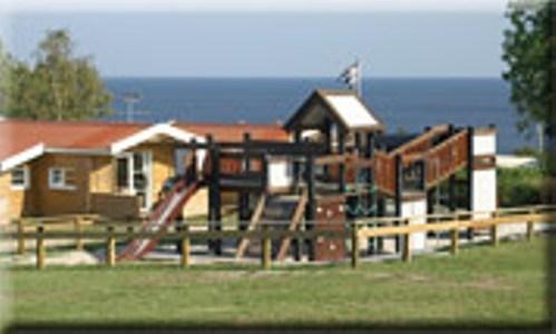 Отель Sandkaas Family Camping & Cottages