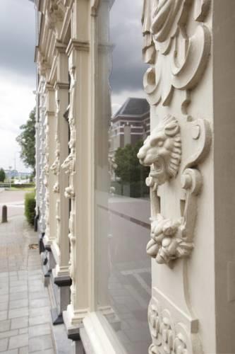 Апартаменты Huis met de Leeuwenkoppen