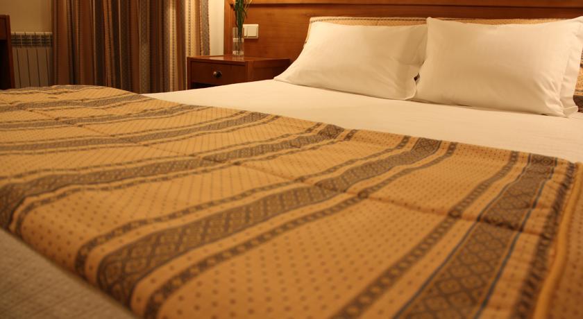 Отель Hotel dos Loios