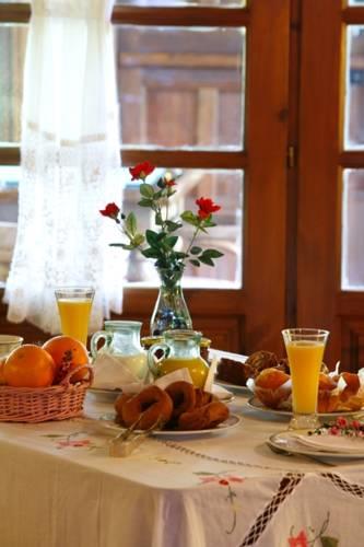 Отель Apartamentos Rurales L'Arquera