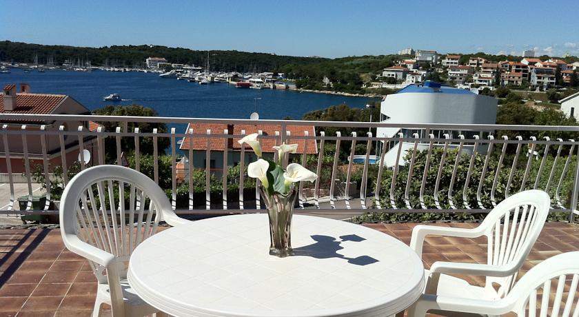 Апартаменты Apartments By The Sea