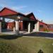 Отель Econo Lodge Inn & Suites Straits Breeze