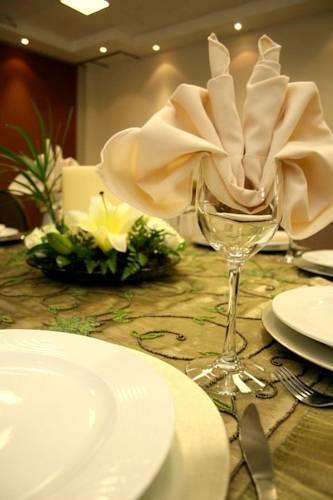 Отель Quinta Dorada Hotel & Suites