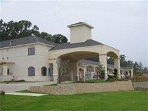 Отель Scottish Inn and Suites 
