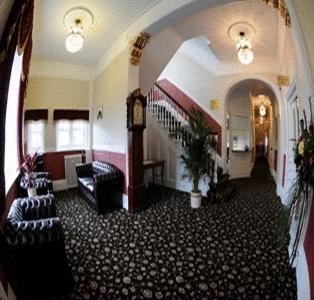 Отель The Manor Hotel