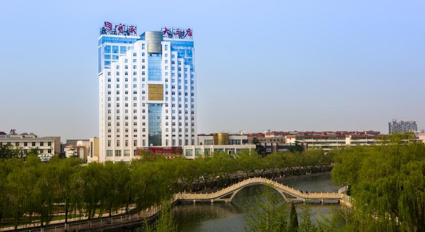Отель Blossom Hotel - Taian
