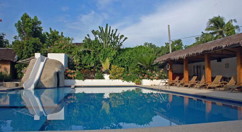 Отель Marcosas Cottages Resort