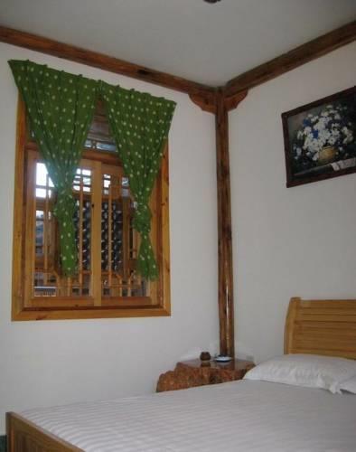 Отель The Moonshine Inn of Dali