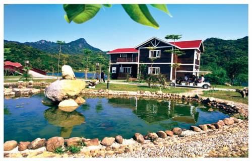 Отель Hannan Tianchi Taoyuan Hotel