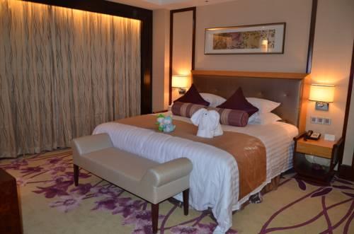 Отель JoyHome New Century Hotel