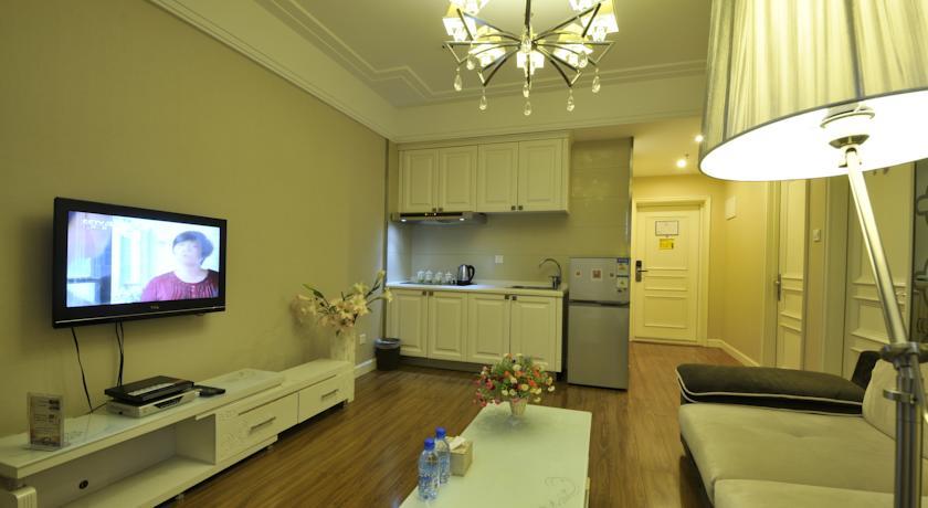 Апартаменты Dalian Yijia Express Apartment