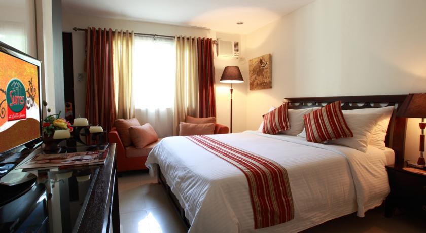 Отель The Suites at Calle Nueva