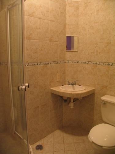 Апартаменты Hotel y Suites Bugambilias